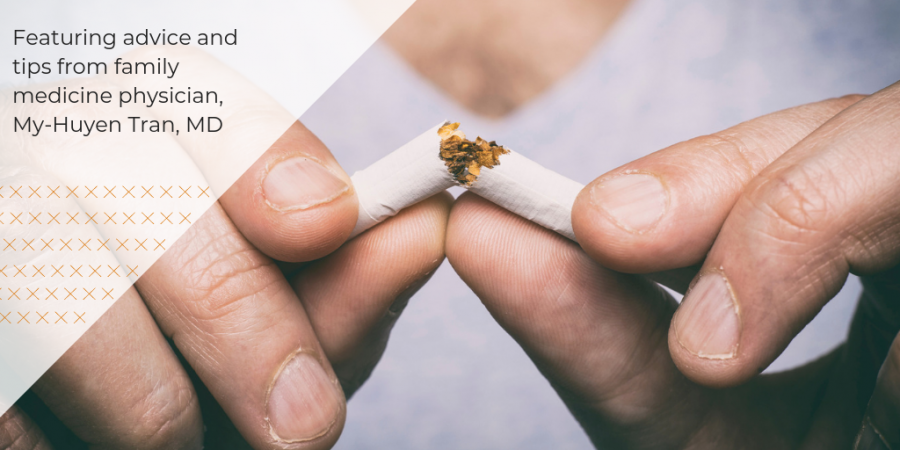 man snapping a cigarette in two